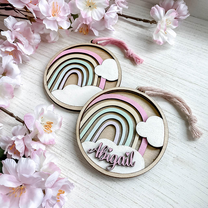 与亲女洗澡时伦了 laser cut wooden ornaments with rainbows and colorful names